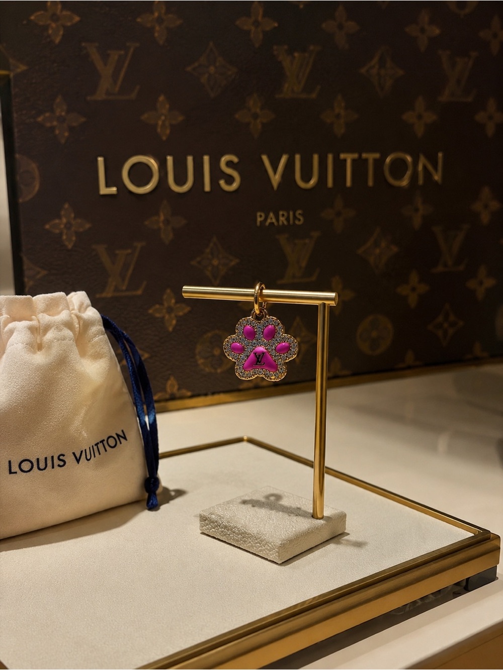 Louis Vuitton stamped pink Paw Charm Pendant zipper pull